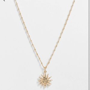 ASOS DESIGN necklace with sun pendant in gold tone